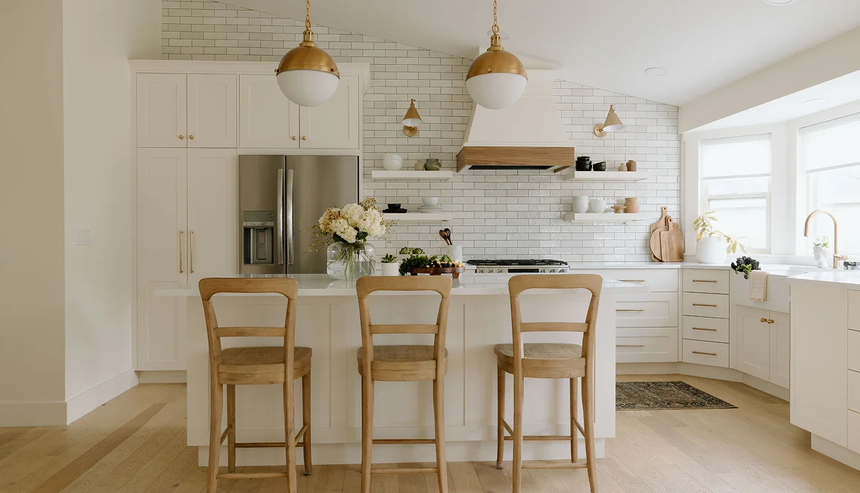 Modern white kitchen with gold accents